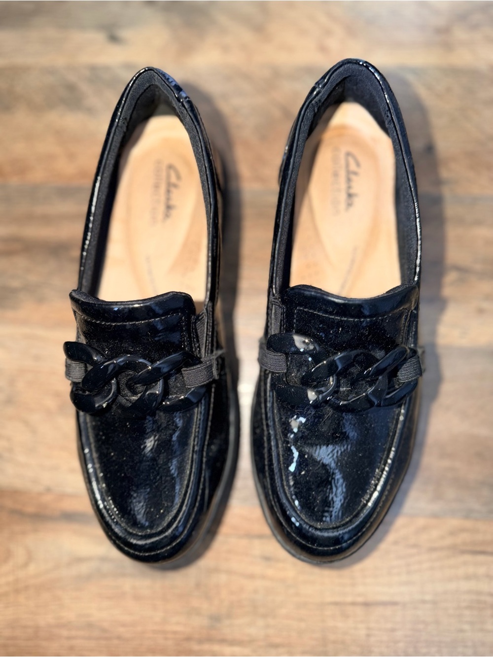 Clarks Black Patent Loafers with Chain Accent
